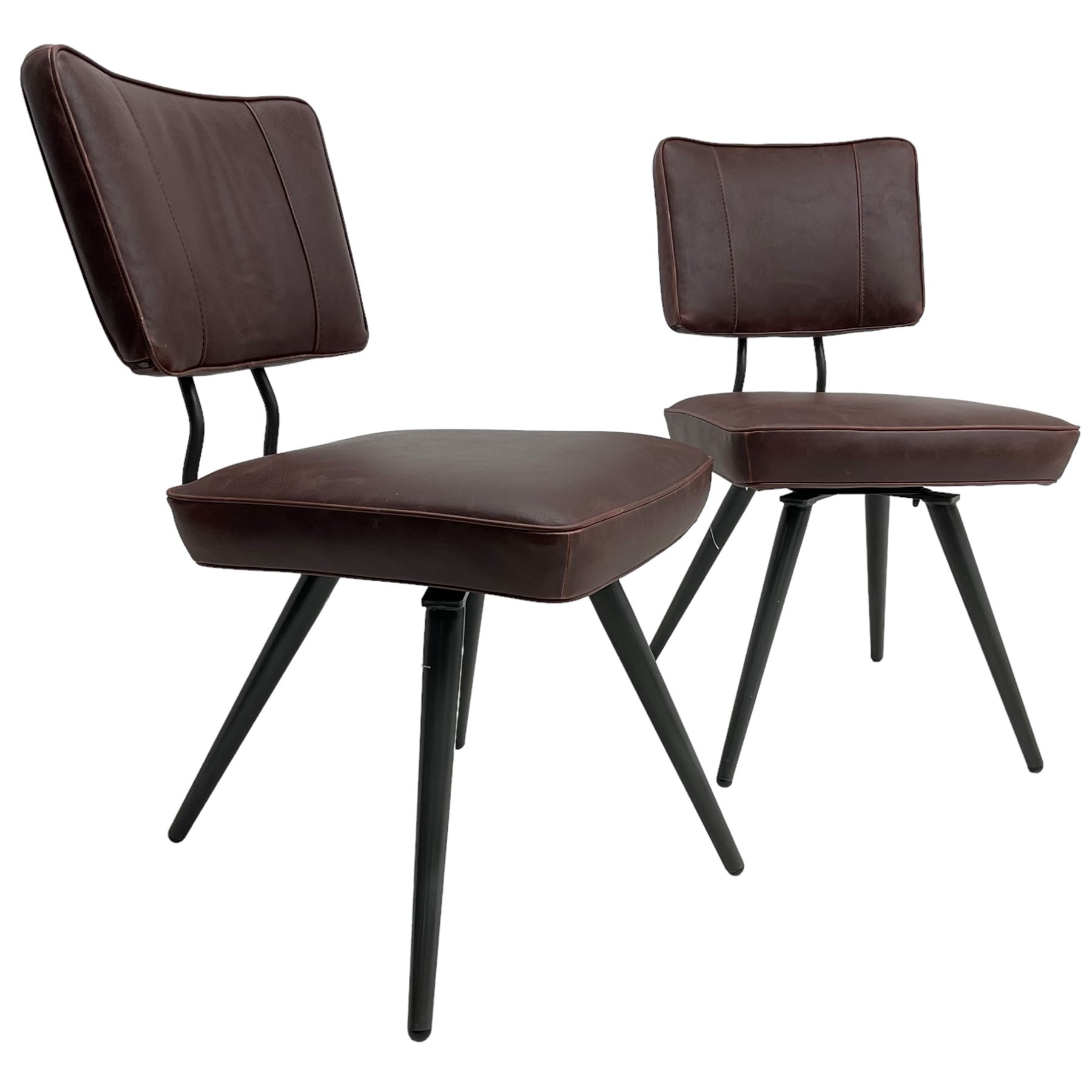 Barker & Stonehouse - pair of 'Sawyer' swivel dining chairs, upholstered in dark maroon leather, on splayed metal supports