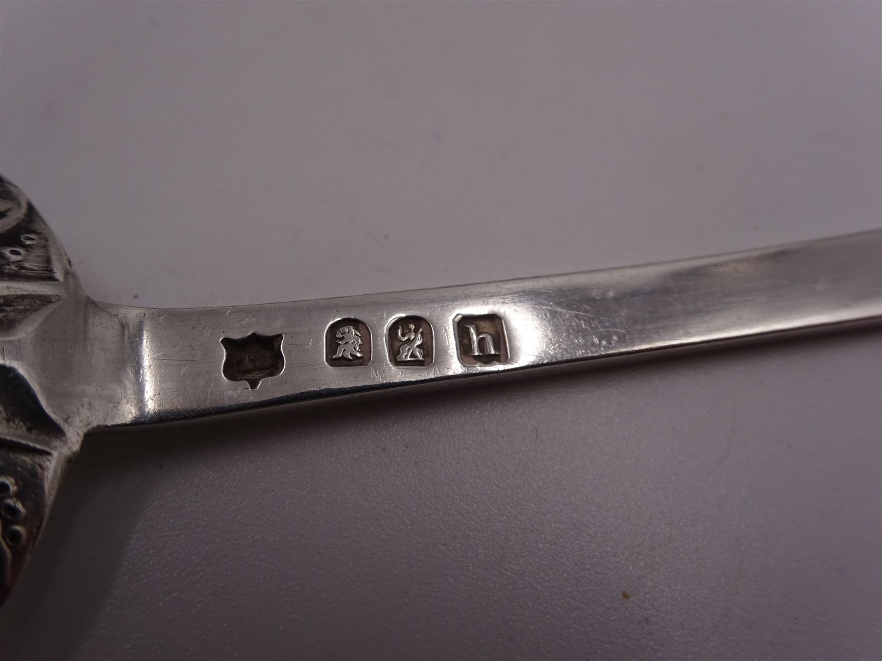 Five Irish silver spoons, comprising Old English pattern table spoon, hallmarked Dublin 1799, maker's mark JK, pair of George IV Fiddle pattern teaspoons, hallmarked James Scott, Dublin 1824 and two other Fiddle pattern teaspoons, the first example hallmarked Dublin 1837 and the second example hallmarked Dublin 1827, both maker's marks worn and indistinct, together with an early 20th century Britannia Standard silver teaspoon, with beaded scroll decoration and rattail bowl, hallmarked Thomas Bradbury & Sons, London 1903