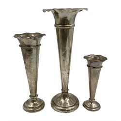 Three hallmarked silver trumpet vases with frilled rims and weighted bases, tallest H24cm