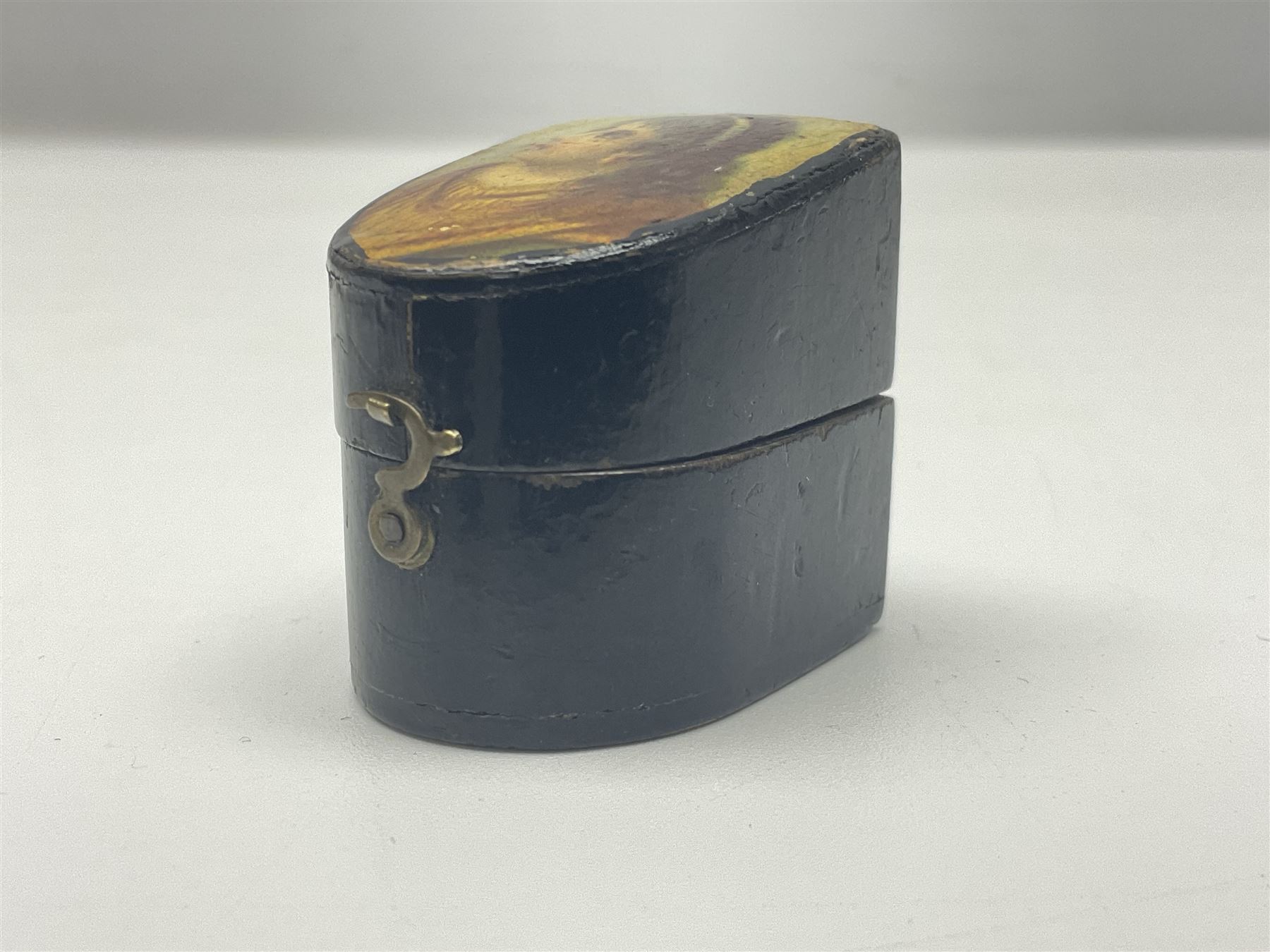 19th century lacquer thimble case with painted portrait of a woman to the hinged lid, together with two mother of pearl egg shaped thimble cases and one other