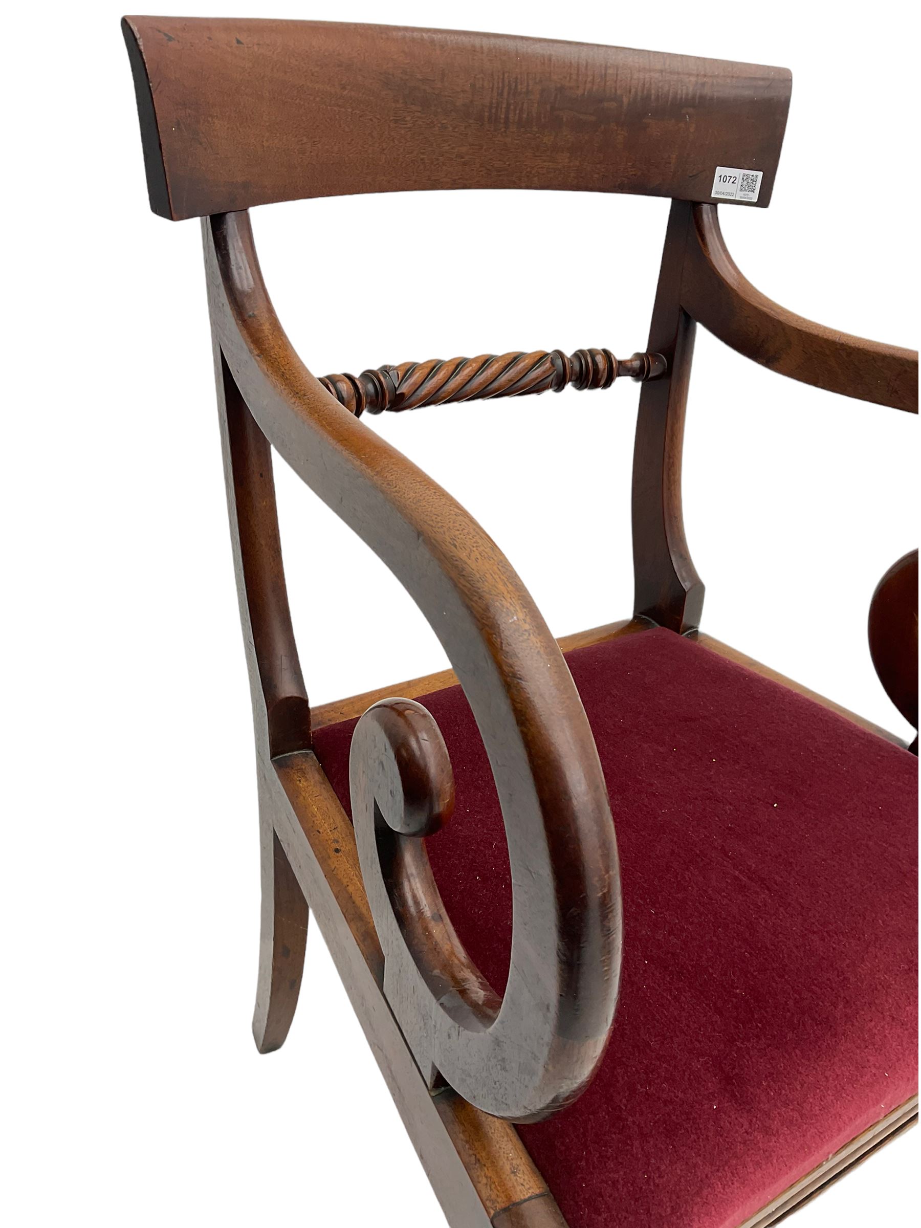 Seven early 19th century mahogany dining chairs - set six side chairs with scroll carved middle rails (W46cm), and a carver elbow chair with rope twist middle rail