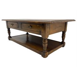 Traditional oak rectangular coffee table, crossbanded top, fitted with two drawers and under-tier