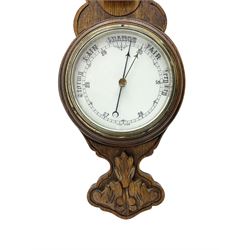 Early 20th century carved oak aneroid barometer