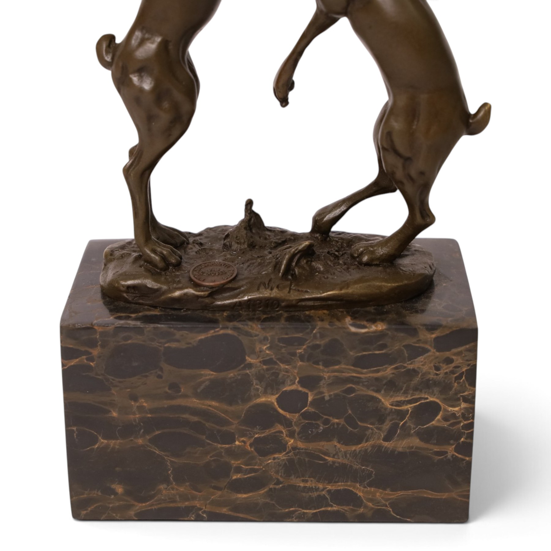 After Mario Nick - two hares boxing, bronze figure group, signed Nick and bearing foundry mark, upon rectangular plinth, H24cm