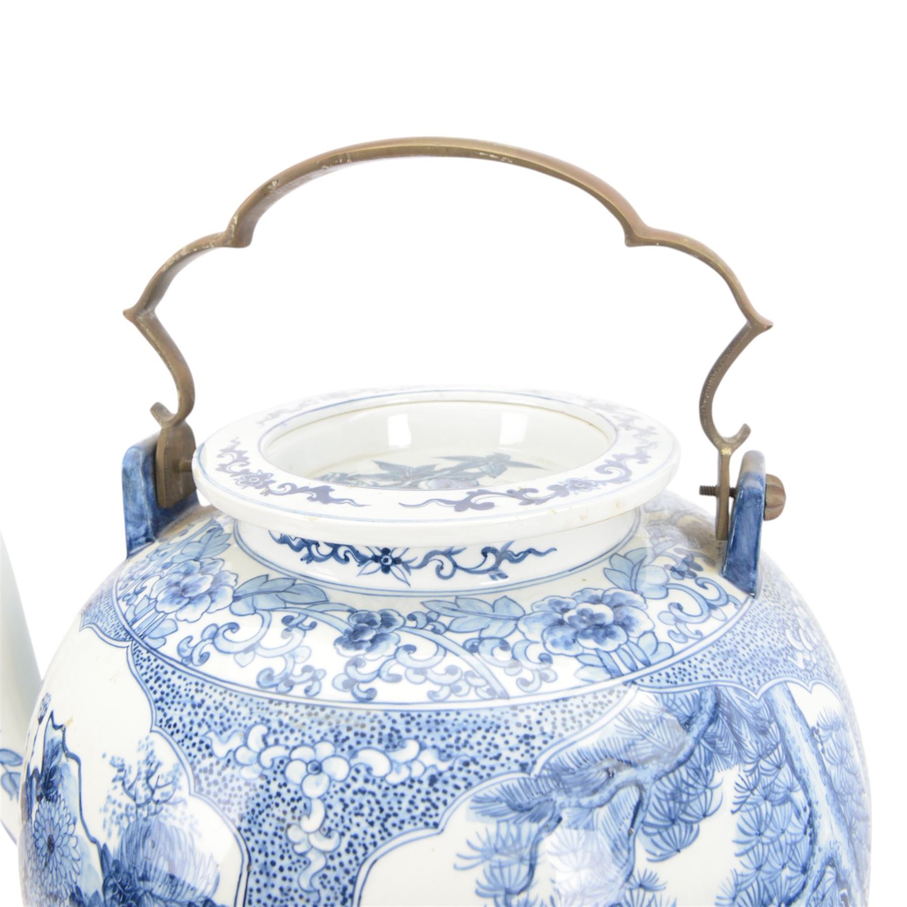 Oversized oriental blue and white teapot, the panels decorated with birds amongst blossoming branches, with a metal handle, four character mark beneath,  H48cm 