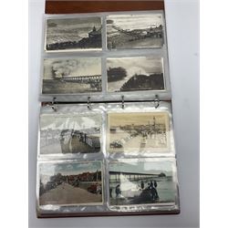 Edwardian and later postcards mostly relating to piers, housed in a ring binder album, approximately 160