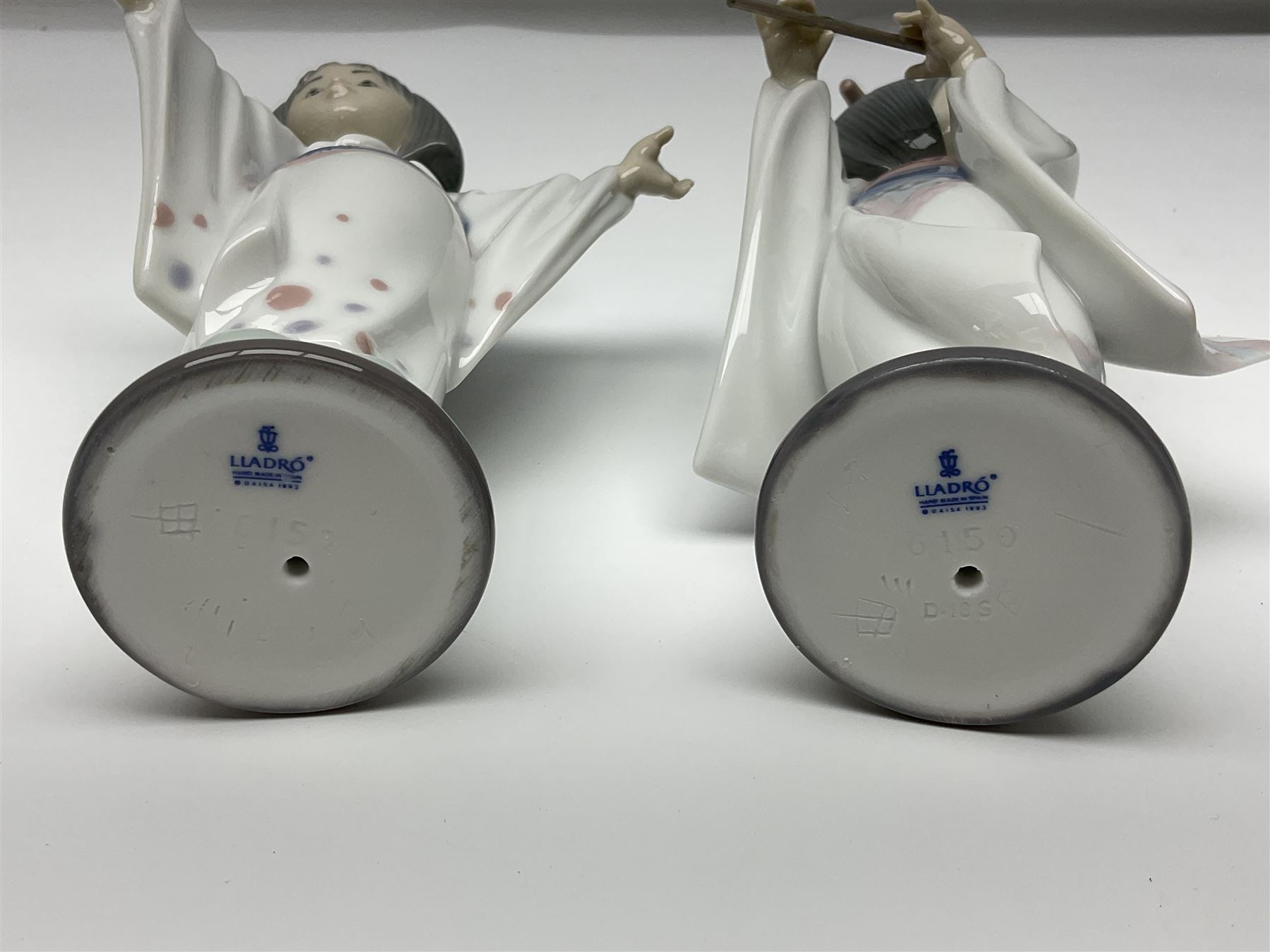 Six Lladro figures of the China doll set and Oriental doll set, comprising Playing the Flute no.6150, Bearing Flowers no.6151, Flower Gazer no. 6152, Oriental Dance no. 6230, Oriental Lantern no. 6231 and Oriental Beauty no. 6232, largest H20cm