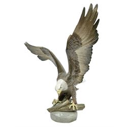 Lladro figure, Liberty Eagle, modelled as an eagle upon a branch with outstretched wings, limited edition 574/1500, no 1738, year issued 1998, year retired 1999, H40cm  