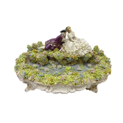  Early 20th century Venetian Luigi Fabris porcelain group 'Fontana Preludio', depicting a courting couple seated amongst floral encrusted flowers above a fountain, signed to base, L37cm  