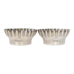 Pair of Walker and Hall silver open salts with crimped edges, hallmarked, D4.5cm