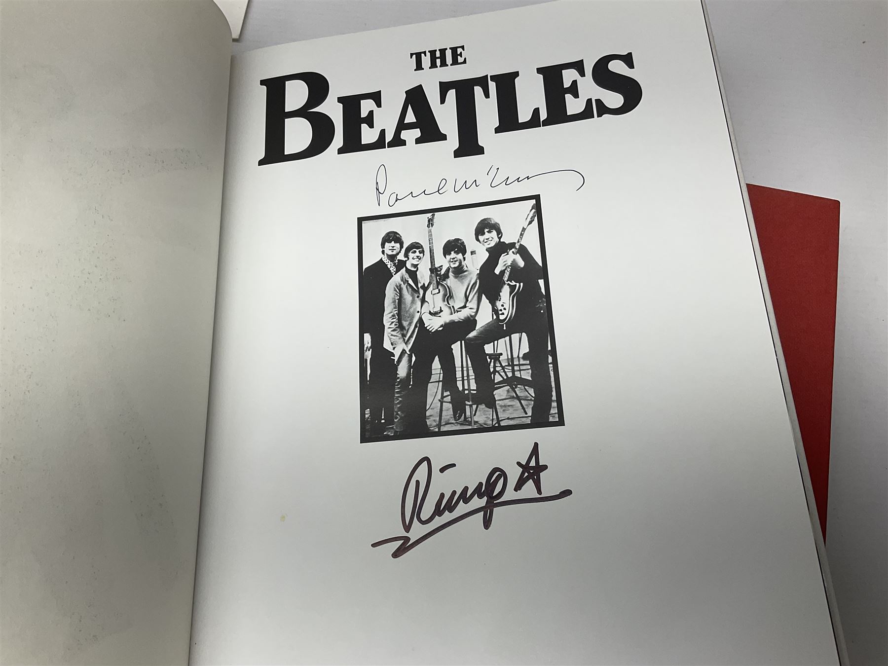 James Bond Casino Royale book signed by Daniel Craig, Judy Dench and other case members, together with Beatles book and Wing dust cover with spurious signature and other signed TV and sport memorabilia 