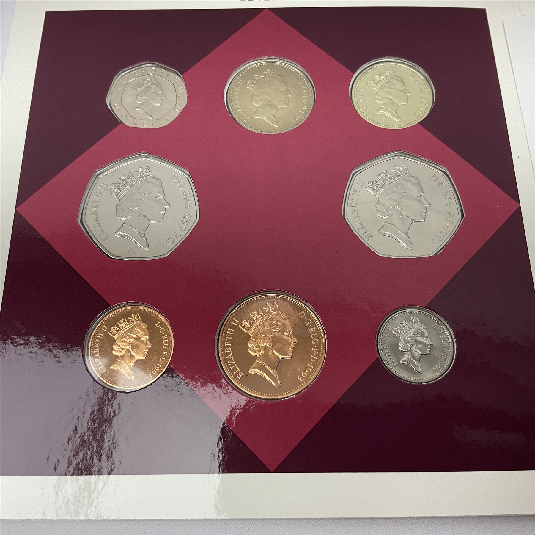 The Royal Mint United Kingdom 1992 and 1993 brilliant uncirculated coin collections, both including dual dated 1992/1993 EEC fifty pence coin, in card folders