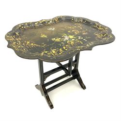 Victorian papier-mâché folding table, black lacquered with gilt floral decoration and inlaid with mother of pearl