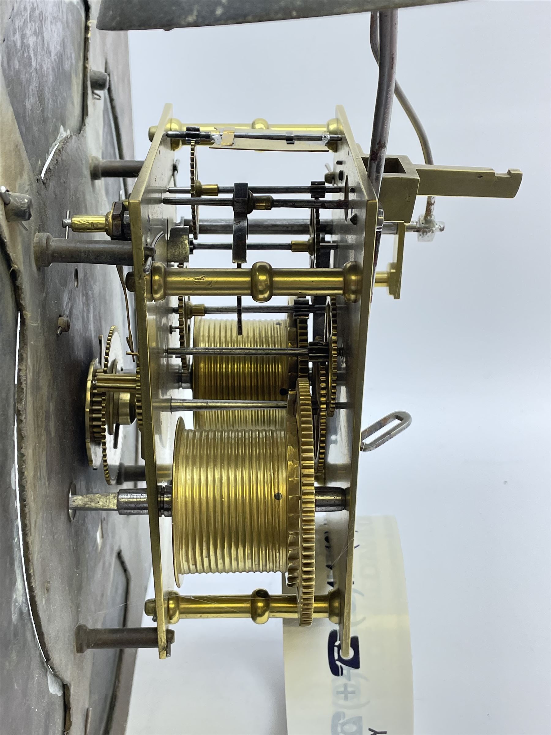 Late 18th century clock movement and dial, square brass dial with Arabic and Roman chapter ring signed 'Thos. (Thomas) Johnston, Dublin', with subsidiary seconds dial and calendar aperture, the dial set with ornate mask cast spandrels, twin train eight day movement striking on bell, with anchor escapement (34.5cm x 34.5cm, 13 1/2