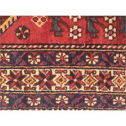 Persian Heriz wool rug, red and ivory field with floral medallion, geometric spandrels, and floral border (157cm x 107cm); Kurdish Shairwan wool rug, red and navy field with three medallions, geometric crosses and serrated border (200cm x 155cm); Persian Qashqai wool rug, golden-yellow field with boteh motifs and wide floral border (127cm x 82cm)
