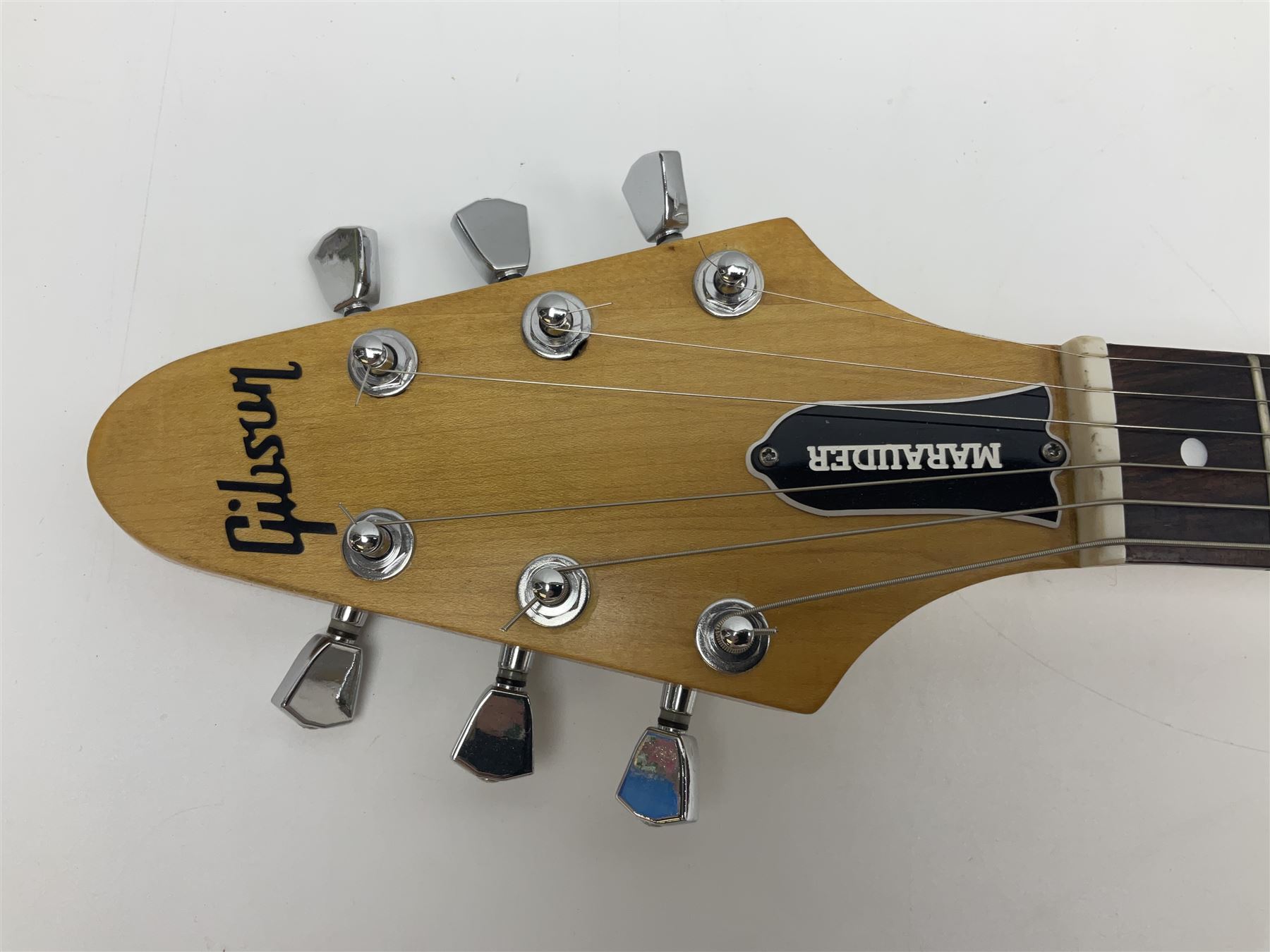 Gibson Marauder style six-string electric guitar with cherry coloured body, marked made in Japan L101cm; in locking hard carrying case