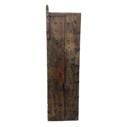 Pair of green-painted Indian doors, c.1860–1880, made from solid teak featuring original iron work and hand-painted finish