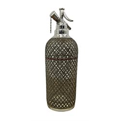 1930s/40s glass and metal mesh covered seltzer bottle, the top inscribed Sparklets Ltd, H34cm
