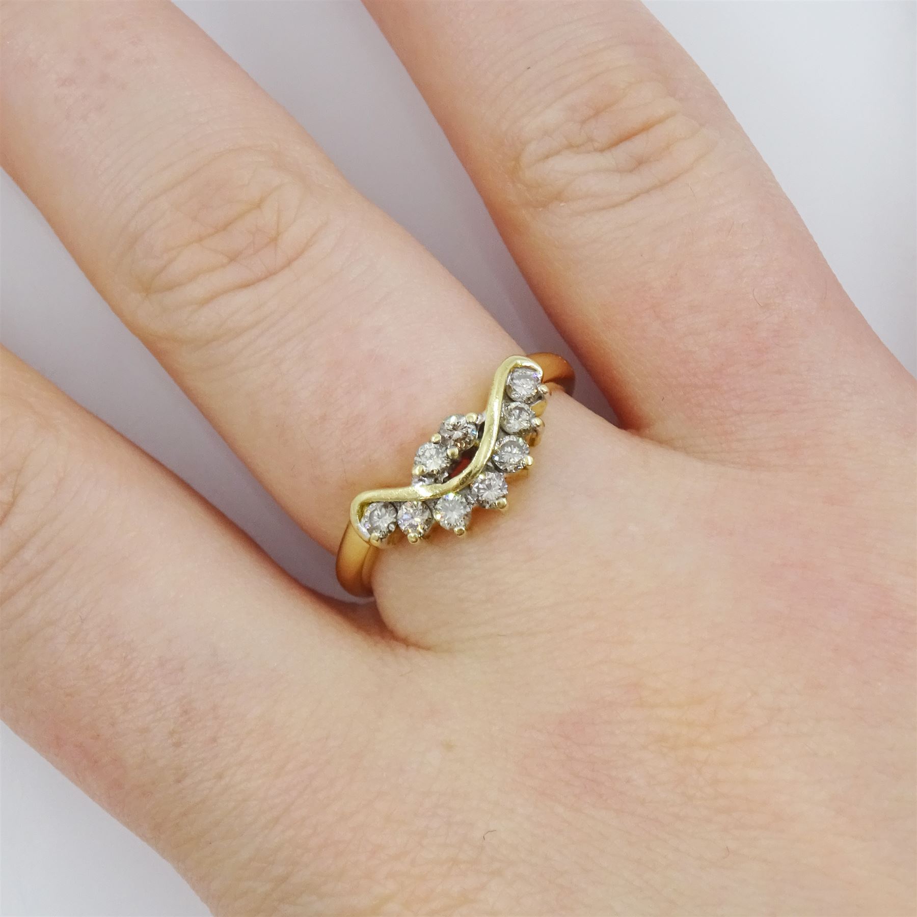 Gold nine stone round brilliant cut, fancy light brown diamond ring, total diamond weight approx 0.35 carat