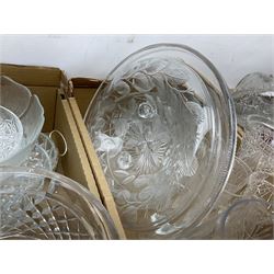 Collection of glassware to include a large footed bowl, water jug, set of four wine glasses, etc, in three boxes
