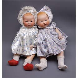  Two Armand Marseille 'My Dream Baby' bisque head dolls, each with moulded hair, sleeping eyes, open mouth with teeth and composition body with jointed limbs, one ,marked 'AM Germany 351/7K' and one marked 'AM Germany 351/8K', largest H57cm (2)  
