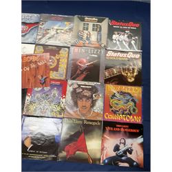 Mostly hard rock vinyl LPs including AC/DC 'Powerage', 'The Razors Edge', 'Dirty Deeds Done Dirt Cheap', 'Blow Up Your Video', 'High Voltage', 'Flick Of The Switch' etc, Status Quo 'On the Level' etc, Thin Lizzy 'Live And Dangerous', 'The Continuing Saga Of The Ageing Orphans', 'Chinatown', 'Renegade' etc (30)
