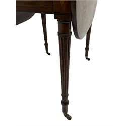 George III mahogany Pembroke table, drop-leaf oval top with satinwood band, fitted with single end drawer, inlaid with satinwood lozenge motifs, on turned and reeded supports with brass cups and castors