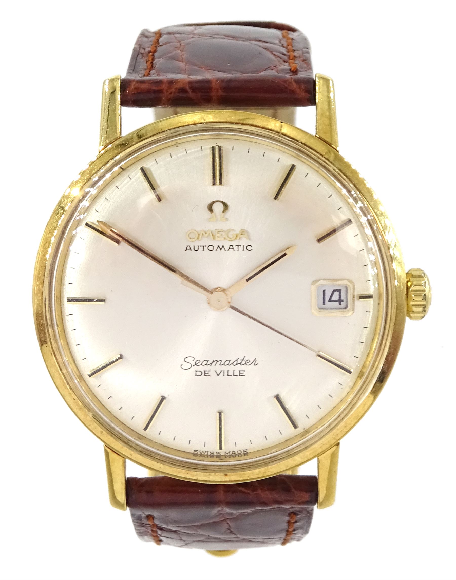 Omega Seamaster De Ville gentleman's 18ct gold automatic wristwatch, Ref. 166020 SC, Cal. 565, silvered dial with baton hour markers and date aperture, stamped 18K, with Helvetia hallmark, on an Omega brown leather strap with Omega gilt buckle
