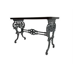 The Louis - late 19th century French design cast iron table, end supports pierced with scrolled foliate decoration and swags, united by stretcher, the base with a silver finish, with later stained hardwood top