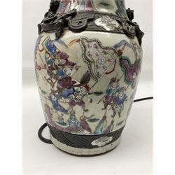 Chinese vase of baluster form, converted to a lamp base, in the Nankin style, decorated with a battle scene with oxidised trim, H44cm