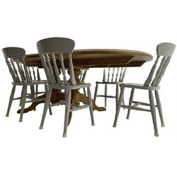 20th century pine extending dining table, oval top over twin bulbous turned pedestal base united by stretcher, with additional leaf (W160cm D120cm H79cm); and set of seven ash painted dining chairs, spindle back, raised on ring turned supports joined by H-stretcher