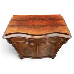 Victorian mahogany chiffonier, with serpentine front and book-matched veneered top, over a frieze drawer and cabinet, raised on pad feet