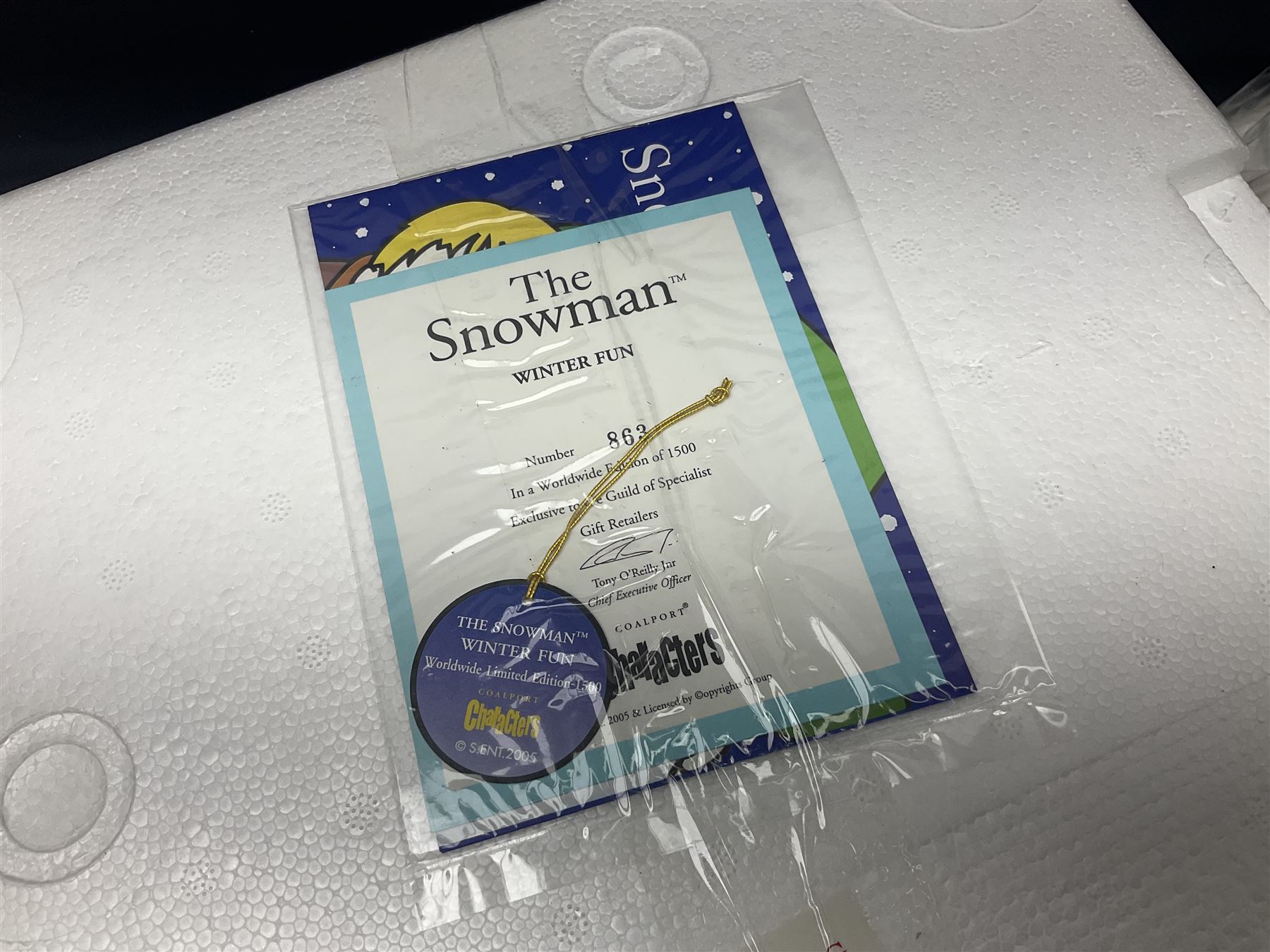 Three Coalport Characters The Snowman figures, comprising Dinner for Two, Off Piste and Winter Fun, all with certificates and original boxes 