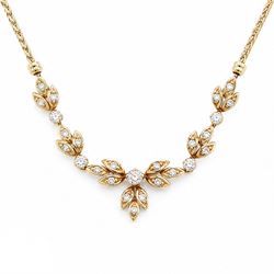 18ct gold diamond floral design necklace, five round brilliant cut diamonds, each spaced b...
