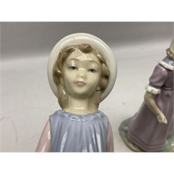 Four Lladro figures, comprising Pulling Dolls Carriage no 5044, Belinda with her Doll no 5045, Pretty Pickings no 5222 and Shepherdess with basket no 4678 