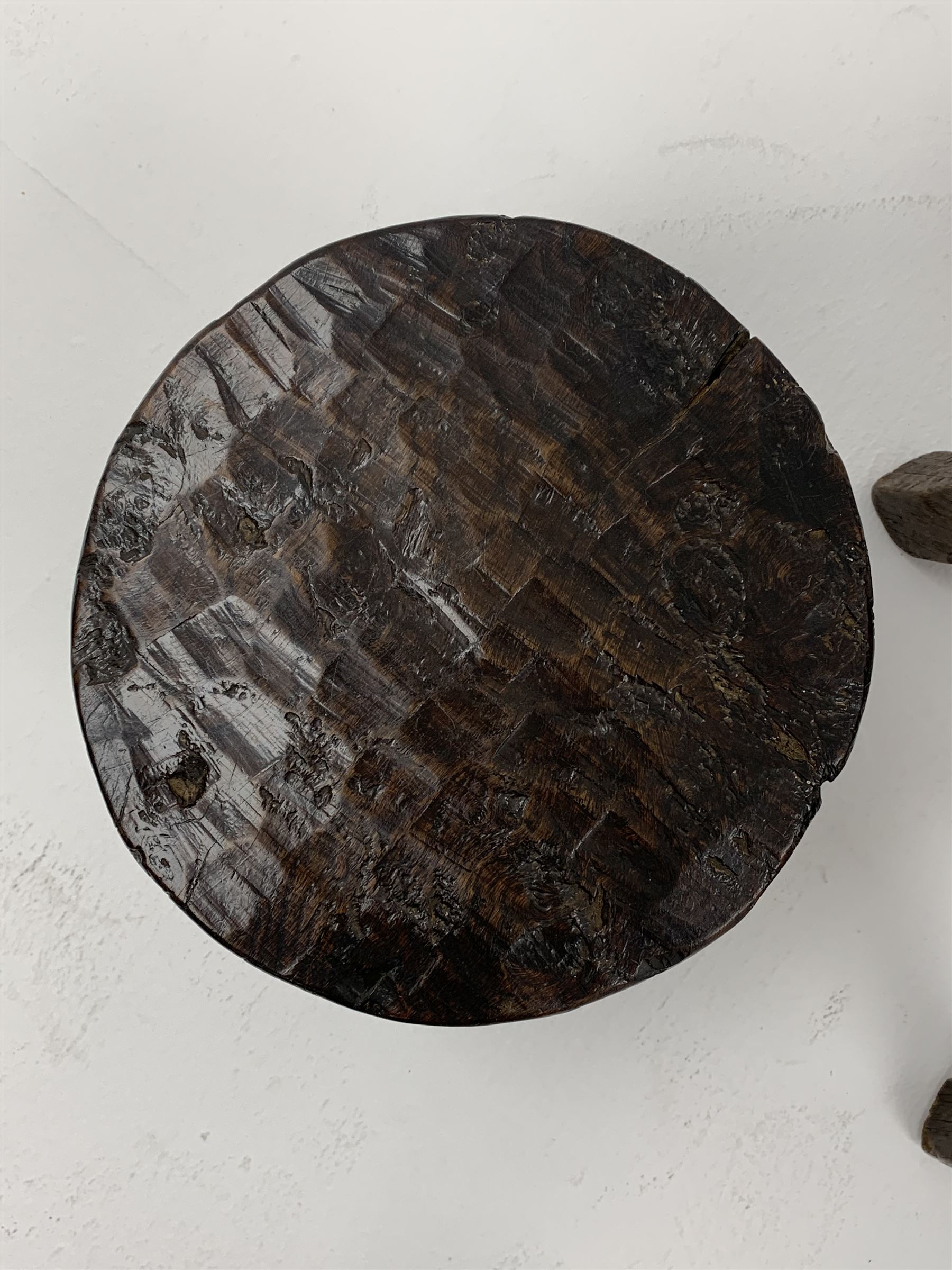 Collection of three mid 20th century stools by Jack Grimble of Cromer - rectangular tooled oak seat on four splayed supports (38cm x 31cm, H35cm), circular tooled burr oak seat on three supports (D29cm, H35cm), shaped burr top on three supports (L44cm, H45cm), each signed underneath