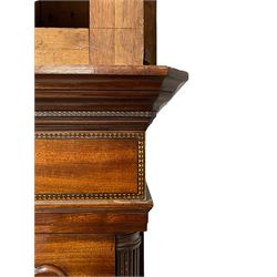 John Morgan of Aberystwyth - fine George IV mahogany 8-day longcase clock c1820, with a raised swan necked pediment, ball and eagle finial and deep inlaid frieze beneath, square hood door with a glazed circular wooden bezel and canted corners, long trunk with reeded quarter columns and a wavy topped door, rectangular plinth on bracket feet, circular painted dial with Roman numerals, minute track, makers name, and brass stamped hands, rack striking four pillar movement with a recoil anchor escapement, striking the hours on a bell. With weights and pendulum. 
John Morgan is recorded as working in Aberystwyth 1816-35. 