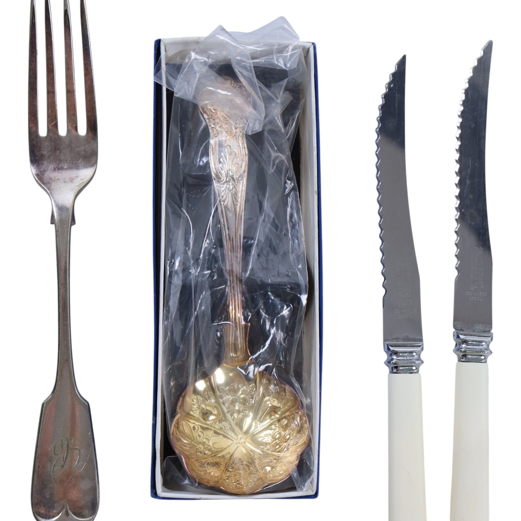 Silver dessert spoon, silver souvenir spoon, silver handled fish knife and two silver napkin rings, together with a collection of silver plated cutlery