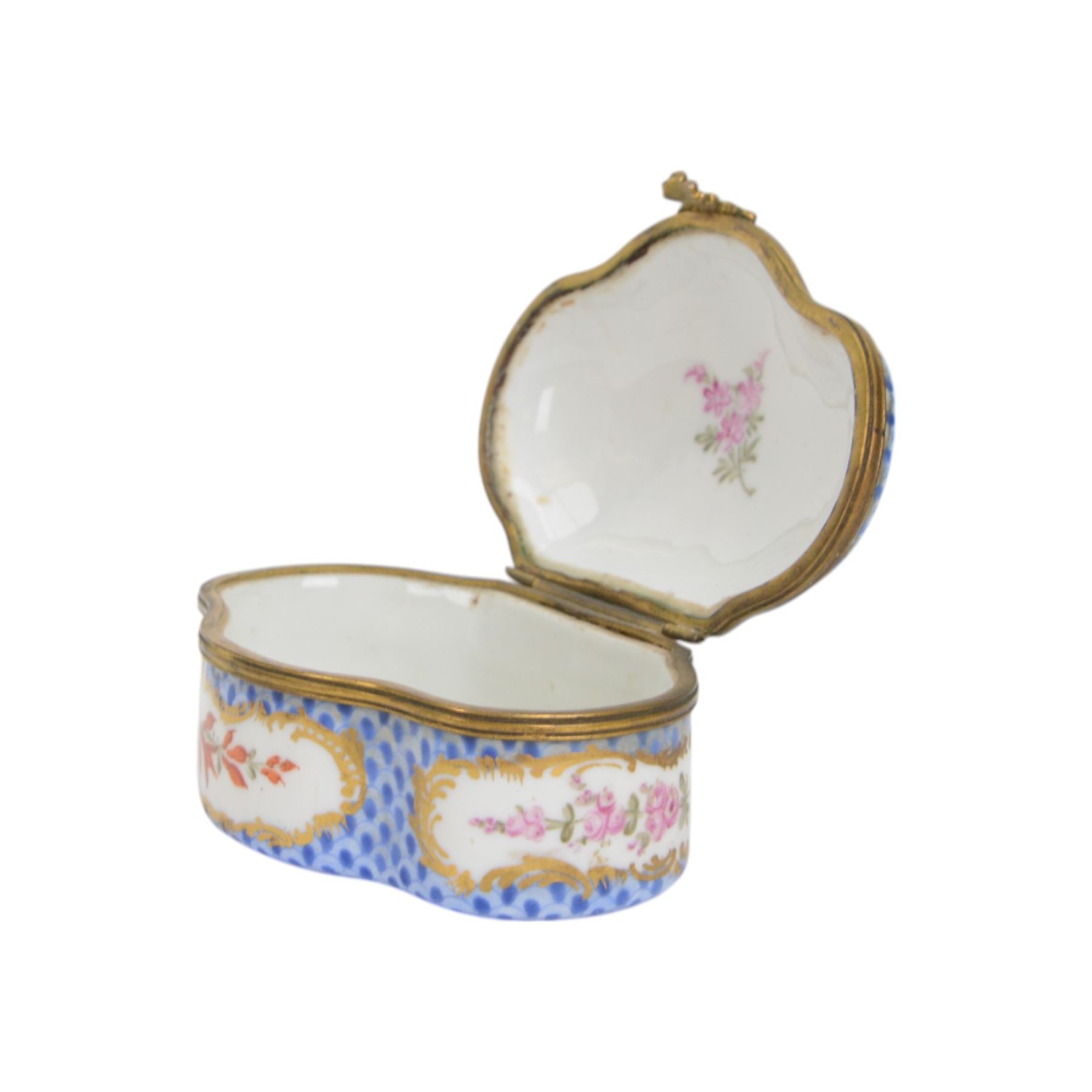 Two 19th century porcelain trinket boxes, comprising blue and white Delft example with courting scene to cover and a Meissen style example, hand painted with floral sprays on a blue scale ground, tallest H4.5cm 