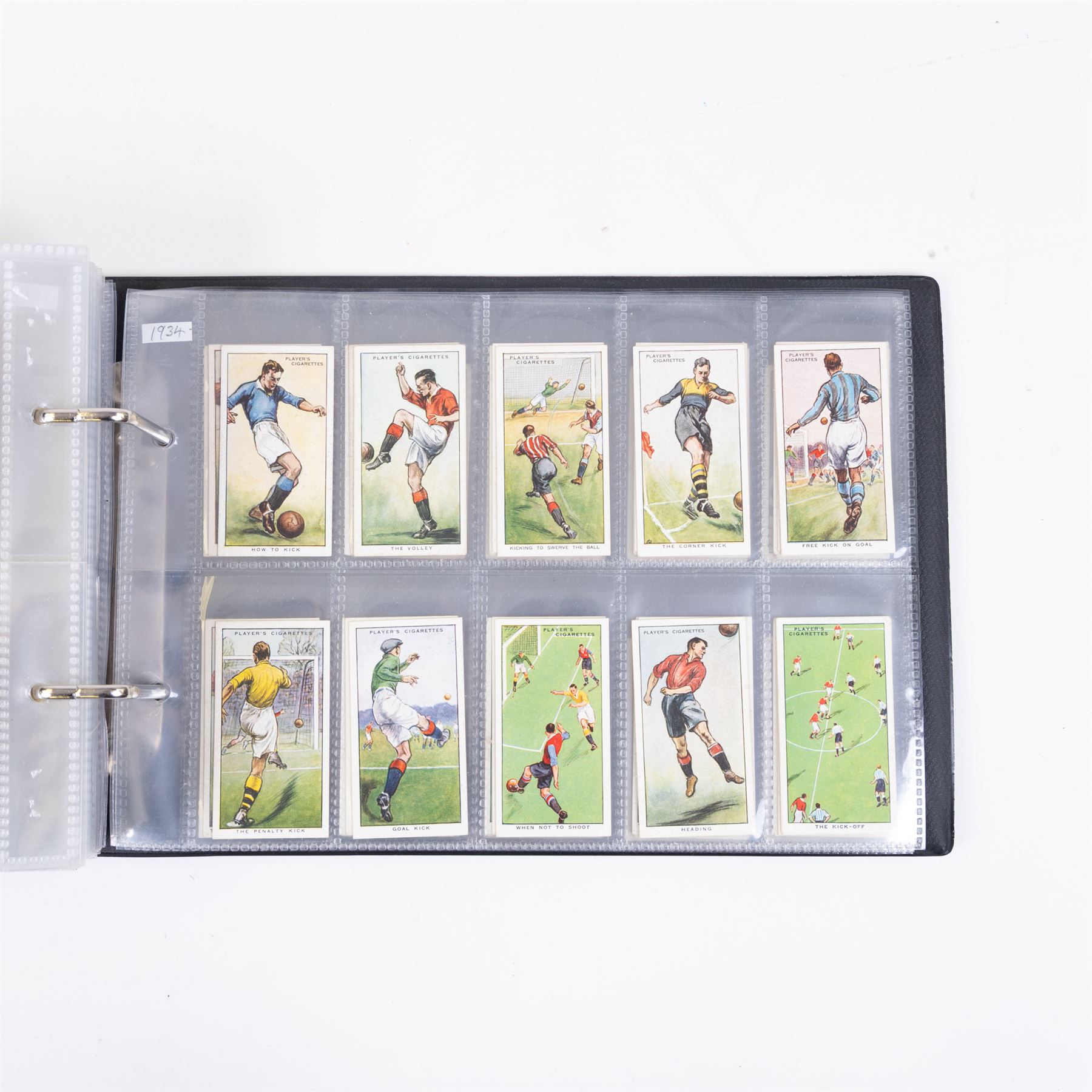 Collection of Edwardian and later Football related trading and cigarette cards, including forty-nine of fifty 1906 Ogden's Football Club Colours, 1922 PALS Footall series, ninety of one hundred 1925 Gallaher Famous Footballers, complete set of forty-four 1926 Ogden's Captains of Association Football Clubs and Colours, complete set of fifty 1927 Players Football Caricatures by MAC,  complete set of fifty 1927 Players Football Caricatures by RIP,  complete set of fifty 1930 Players Association Cup Winners, complete set of 50 1933 Ogdens AFC Nicknames etc, housed in brown cigarette card album