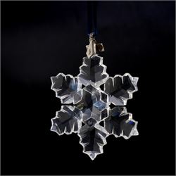 Eight Swarovski crystal snowflake Christmas ornaments, comprising years 1991-1998, some with certificates, boxed (8)