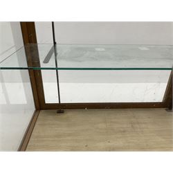 Mid century oak framed glazed display counter, two sliding doors, glazed shelves W182cm, H91cm, D61cm