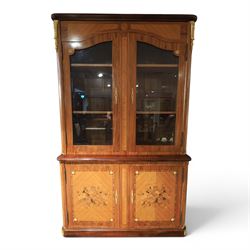 French style marquetry display bookcase, with twin glazed upper doors enclosing shelves, o...