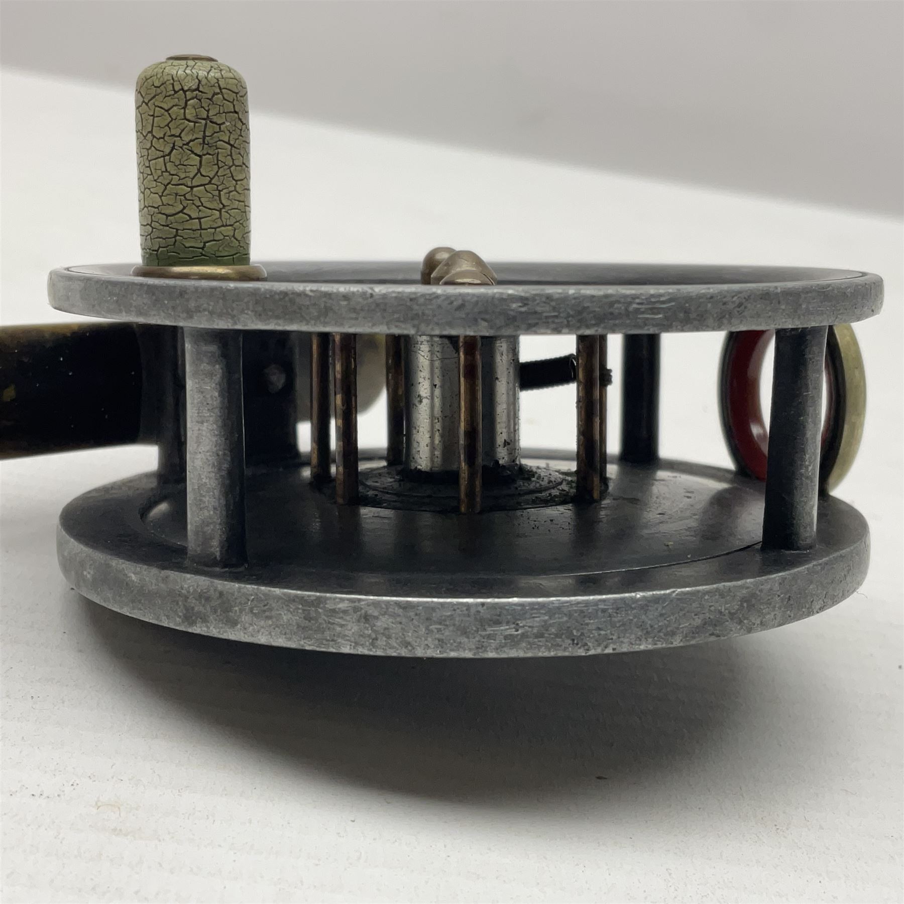 3 inch trout fly reel, with brass foot, original handle and telephone centre latch, unmarked but in the style of Hardy Uniqua 