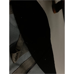  Fender Squier Bronco Affinity Series electric bass guitar, in black and white, serial no. IC021107489, L108cm, in associated Squier soft carrying case. From the collection of the late John Burgess of Beverley who played in the bands Penjants, Wine, Strollers, Revox, Sound Foundation, Pickle Belly Alley, Ragamuffins and Jerryattricks.