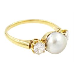 Early 20th century 15ct gold pearl and diamond three stone ring, single grey pearl with an old cut diamond set either side, total diamond weight approx 0.55 carat