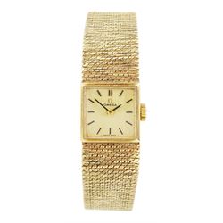 Omega ladies 9ct gold manual wind wristwatch, champagne dial with baton hour markers, on i...
