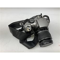 Canon EOS 300D Digital SLR in silver, with Canon 'Zoom Lens EF-S18-55mm 1:3.5-5.6', with soft shell bag and instruction manual