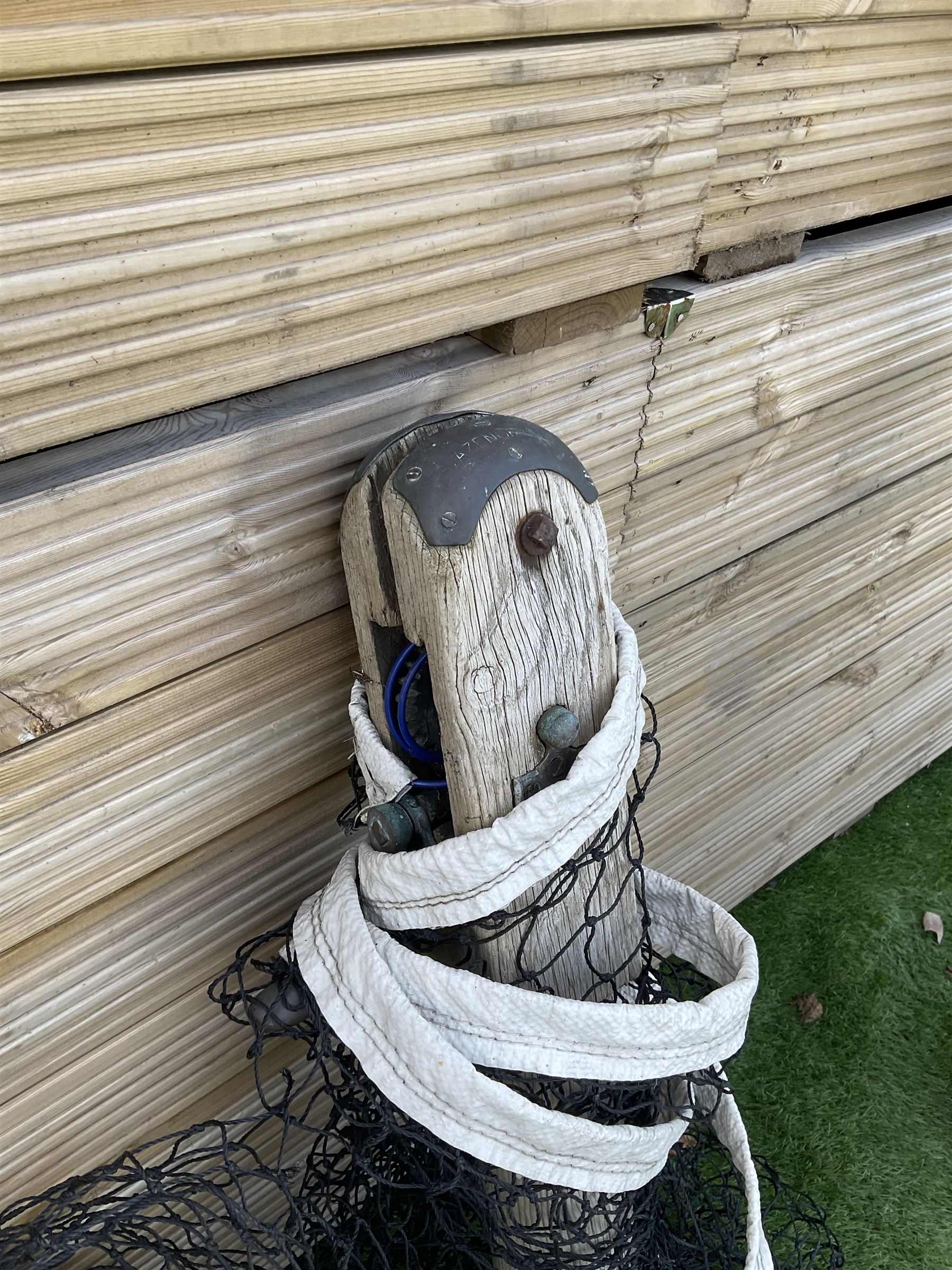Pair of Edwardian cast iron and wood tennis posts, with net - THIS LOT IS TO BE COLLECTED BY APPOINTMENT FROM DUGGLEBY STORAGE, GREAT HILL, EASTFIELD, SCARBOROUGH, YO11 3TX