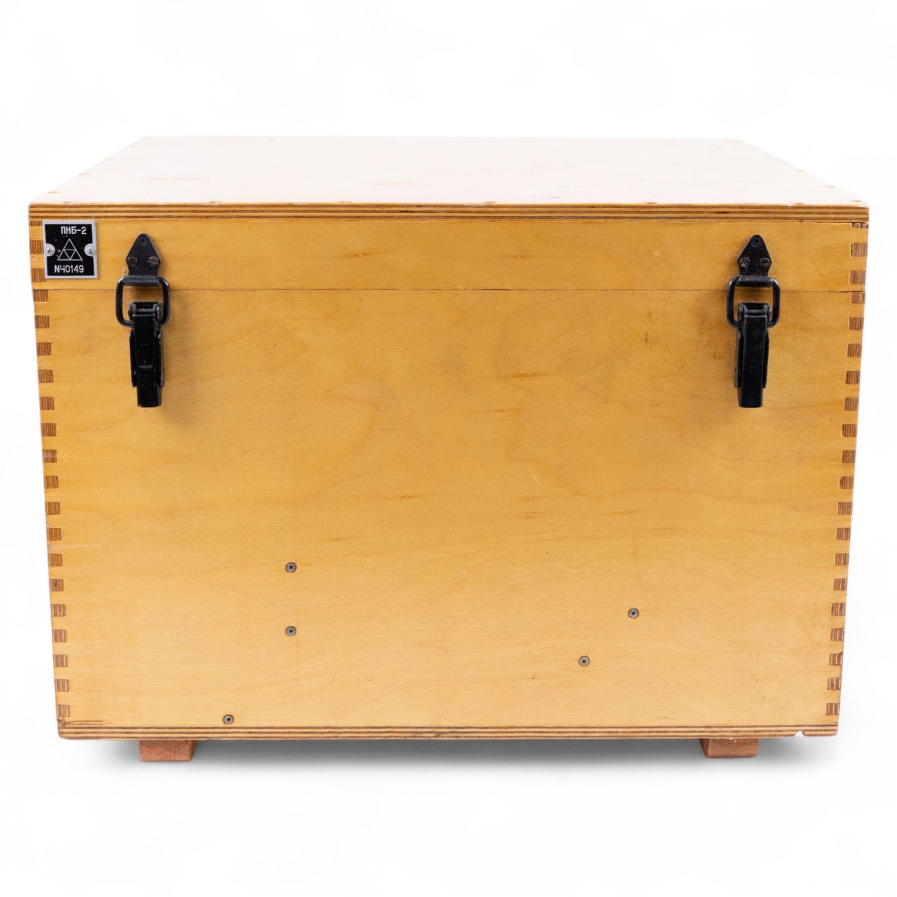 Pair of mid 20th century Russian Helios PNB-2 military observation binoculars, no. 40149, each 'Big Eye' lens 13cm in diameter, with 80 degrees vertical elevation, 360 degrees rotation, spirit level to centre of body, contained in wooden stow case with service manual, canvas cover, two lens caps, a small latched metal tin containing lenses and accessories and on adjustable wooden tripod painted green with pointed feet,  with a small latched metal tin containing eight lenses and accessories